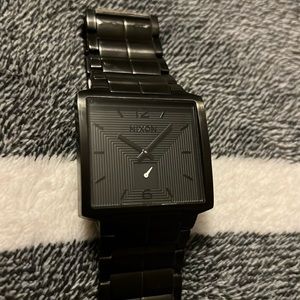 Nixon men’s stainless steel black watch